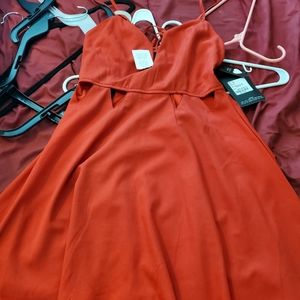 Brand new red cute open in the middle design dress